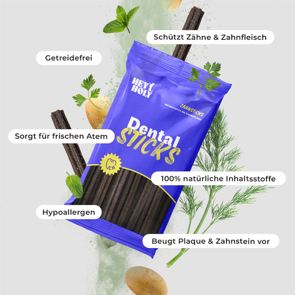 Blaue Tüte Dental Sticks liegt umgeben von Kräutern und Zutaten mit kurzen Wirkungshinweisen rundherum